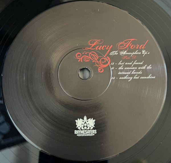 Lucy Ford: The Atmosphere Ep's | Mint (M) Mint (M)-The Happy Cap