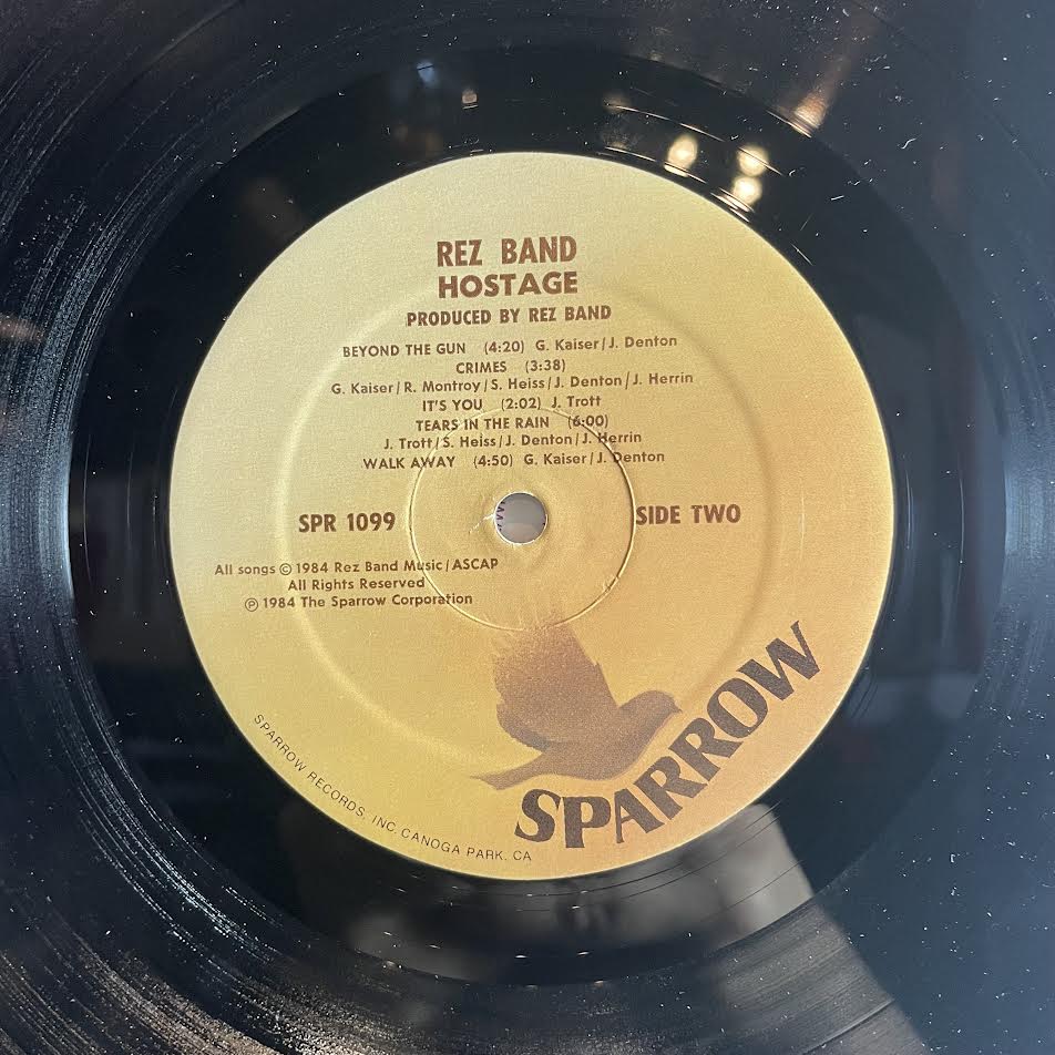 Resurrection Band - Hostage (VINYL) | Very Good Plus (VG+) Near Mint (NM)-The Happy Cap