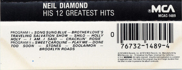 His 12 Greatest Hits (CASSETTE) | Mint (M) Mint (M)-The Happy Cap