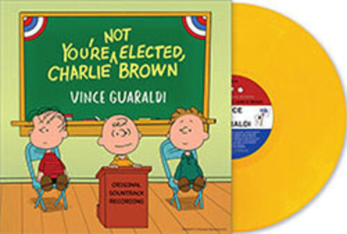 Vince Guaraldi - You're Not Elected, Charlie Brown (IEX: "WOODSTOCK" YELLOW VINYL) | Mint (M) Mint (M)-The Happy Cap